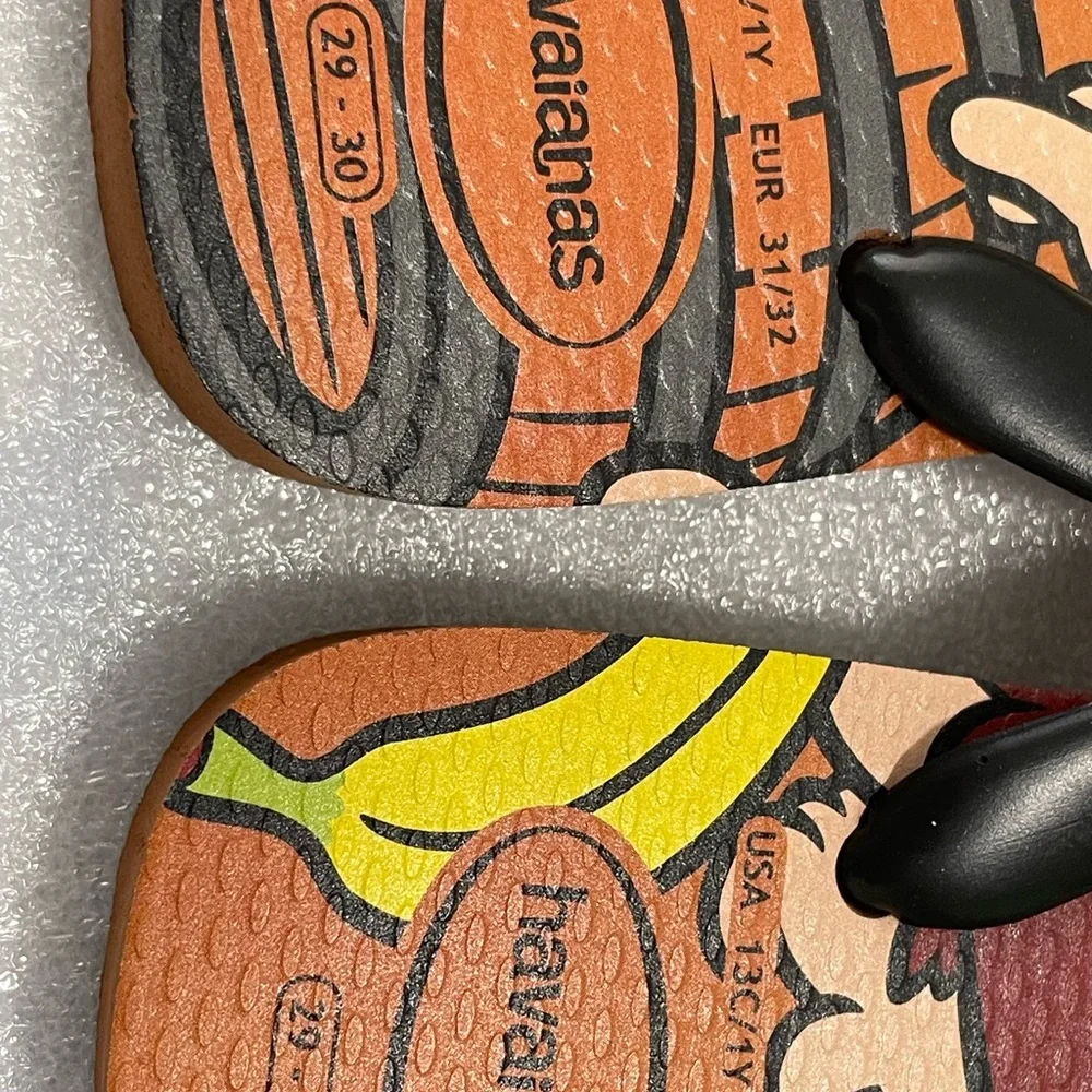 Havaianas Black and Orange Flip Flops